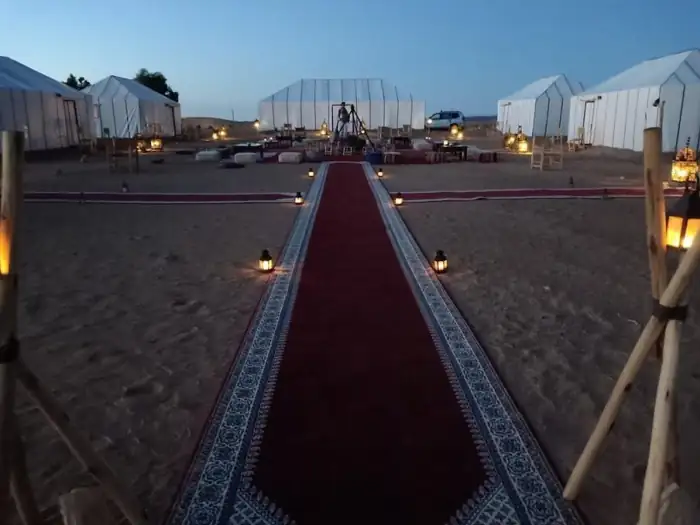 Luxury desert camp under starry sky in Merzouga Sahara Morocco